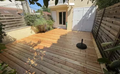 R&eacute;alisation d'une terrasse en m&eacute;l&egrave;ze sur structure bois dans le Val-d'Oise image 